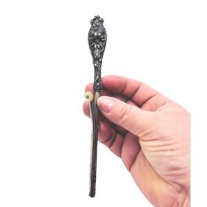 Antique Victorian Sterling top Mechanical hair curler Repousse Floral